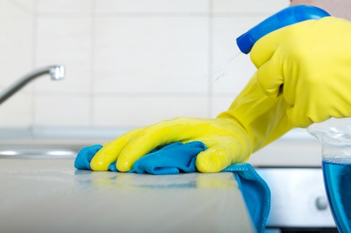 Local cleaner vacuuming fine builders dust in a SE27 property